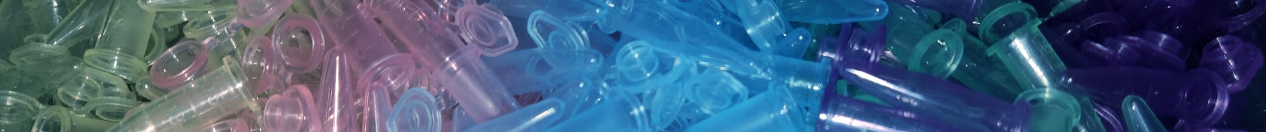 Close-up of centrifuge tubes in assorted colors.